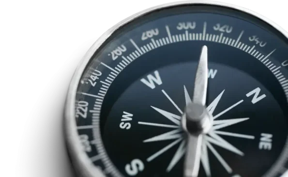 a close up of a compass